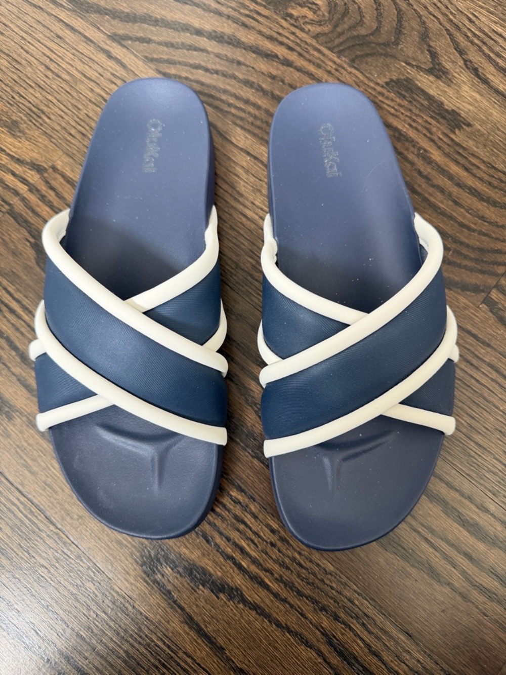 OluKai Navy and White Crisscross Slide Sandals